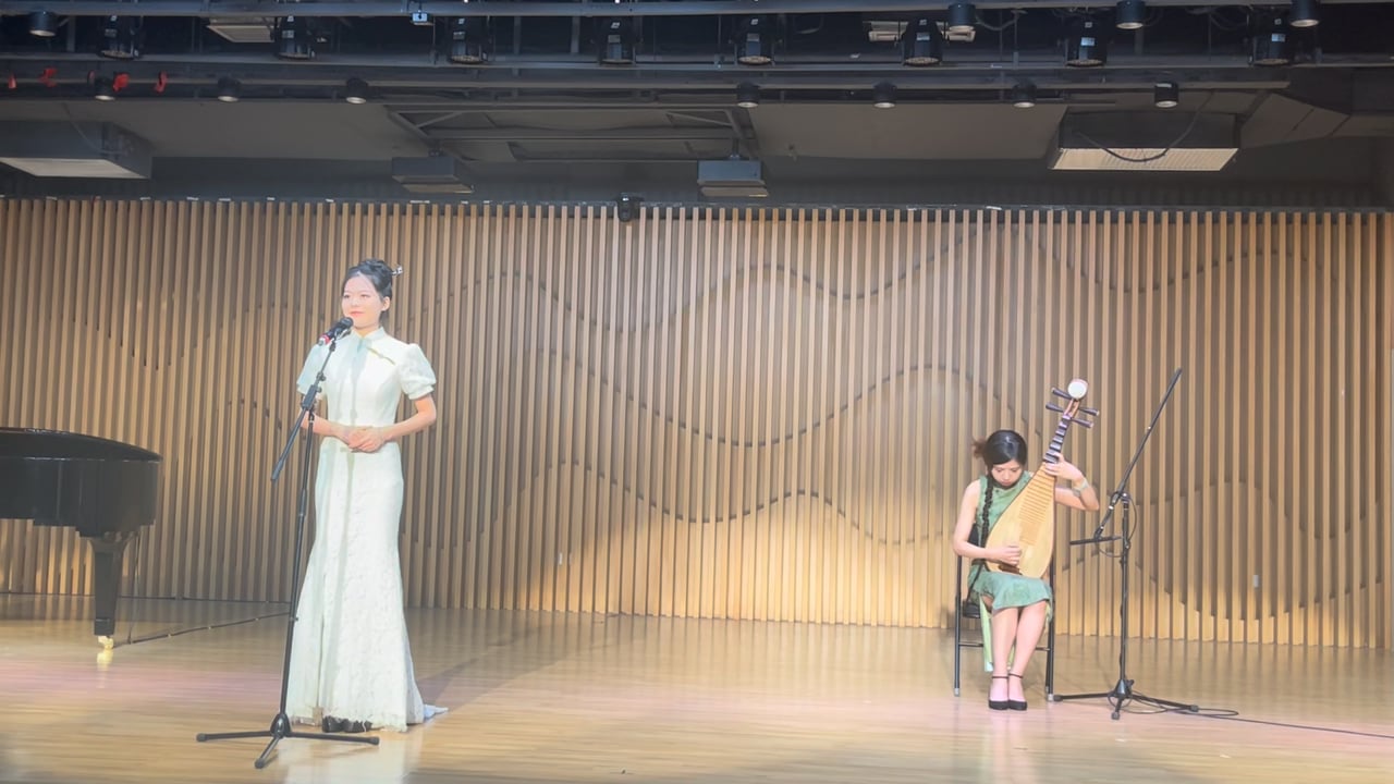 Concert still from Moonlit Night on the Spring River with soprano, pipa and piano